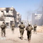 BBC visits ruins of kibbutz Nir Oz, abandoned after Hamas attack