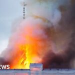 Copenhagen stock exchange engulfed by huge fire